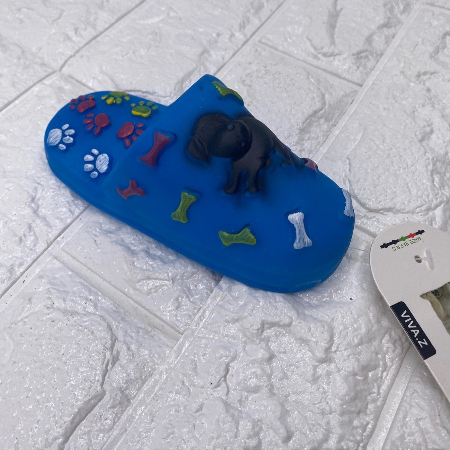 Paw Shoe Squeaky Dog Toy By Viva.Z Blue Rubber Design With Bone & Paw Motifs