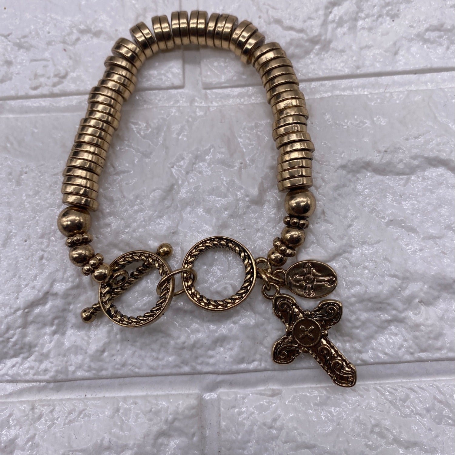 Gold Tone Cross Charm Stretch Bracelet With Toggle & Rhinestone Accents