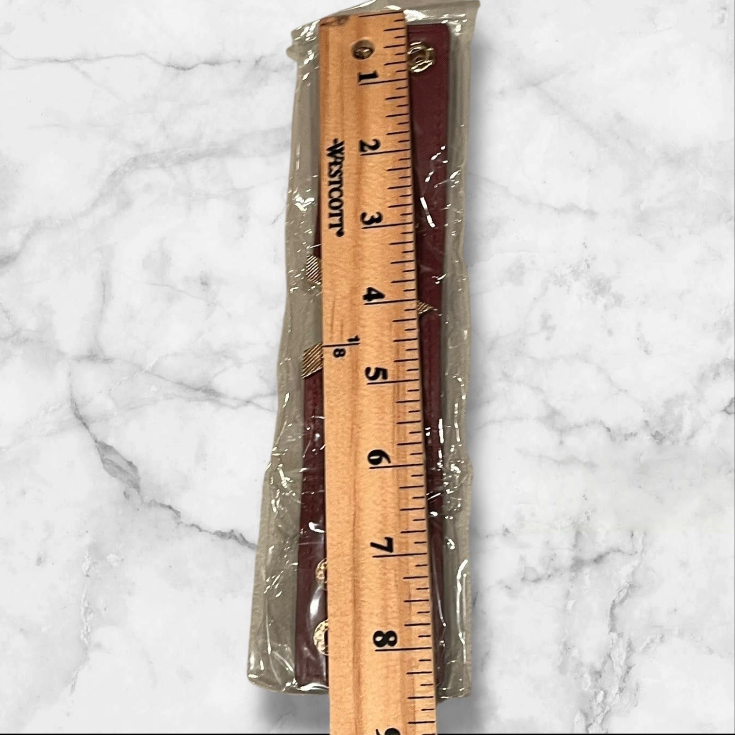 Women’s Burgundy PU Leather Bracelet With Gold "V" Detail & Snap Closure